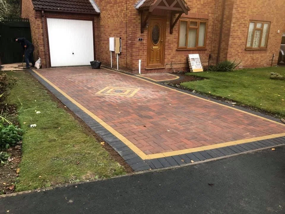 Block-paved driveway with contrasting edges